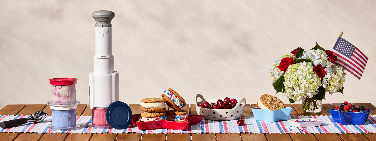 Ice cream maker with containers of ice cream and ice cream sandwiches.